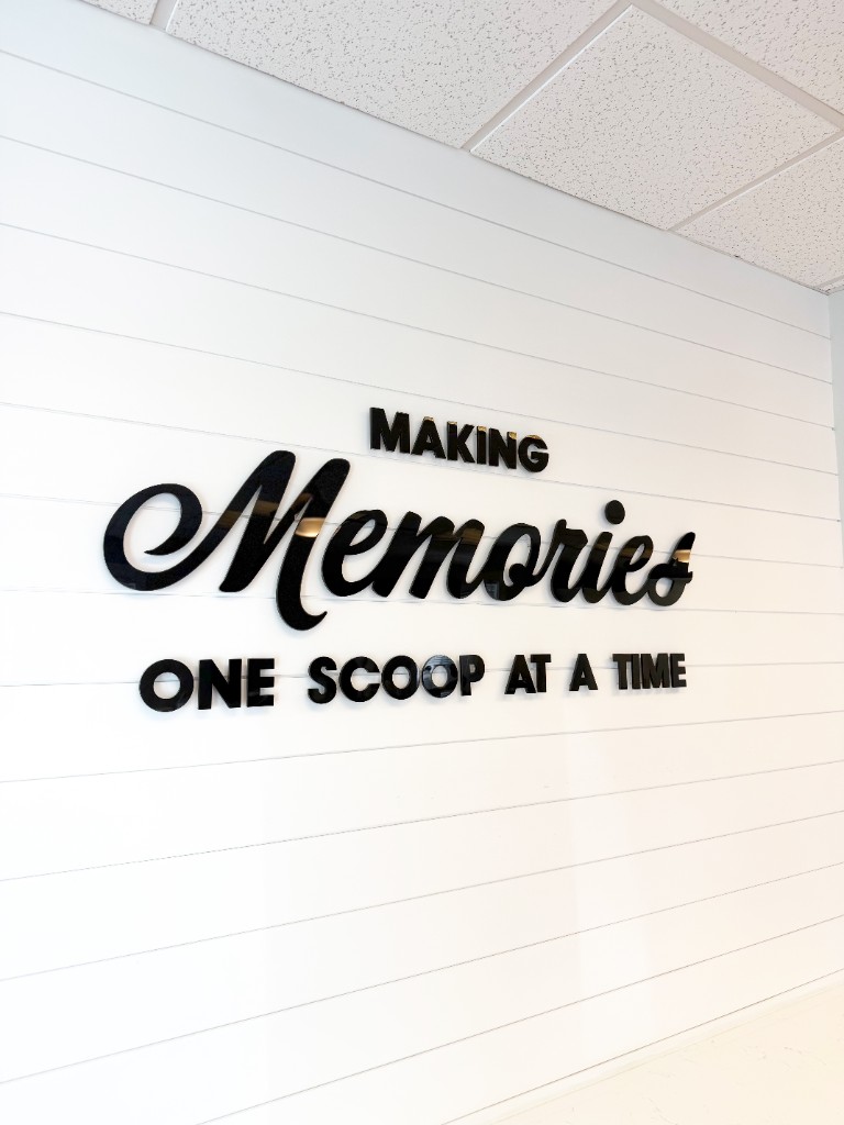 Interior wall sign reading Making Memories One Scoop at a Time