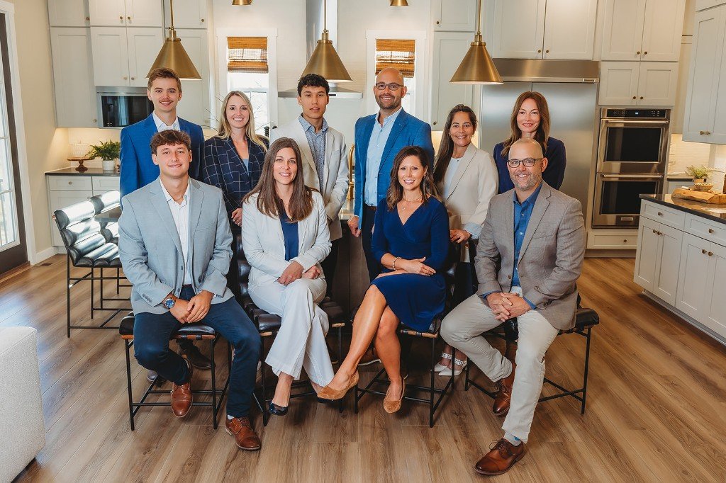 Brad Zimmerman Team group portrait in a modern kitchen